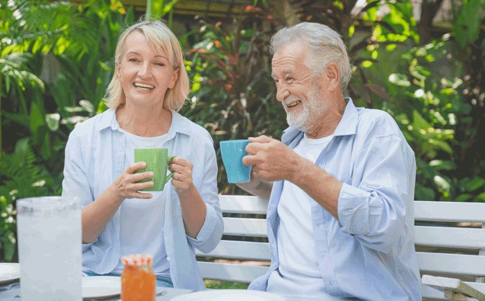 over 55s couple drinking coffee