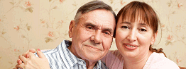 couple with arms around each other